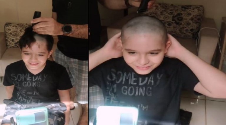 menino raspa cabelos em videochamada para amigo internado com cancer video