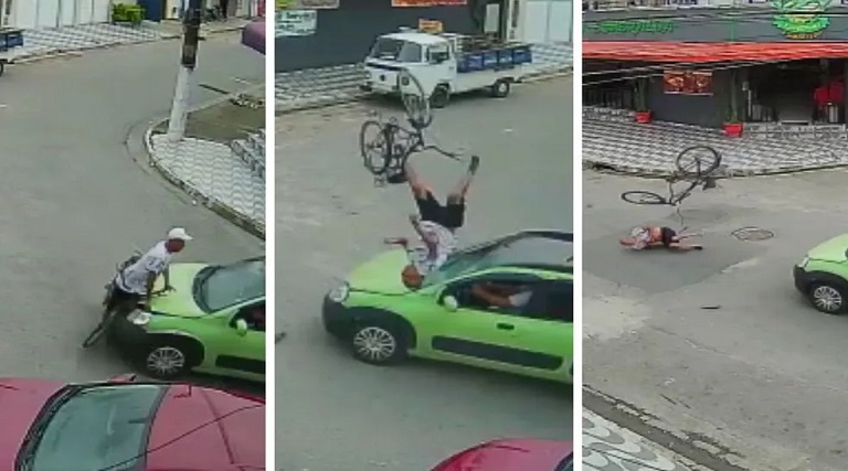video ciclista e arremessado ao ser atingido em cheio por carro em cruzamento
